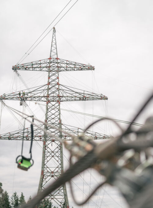 Cteam power line project: equipment suspended from a transmission tower. Cteam power line project: equipment suspended from a transmission tower.